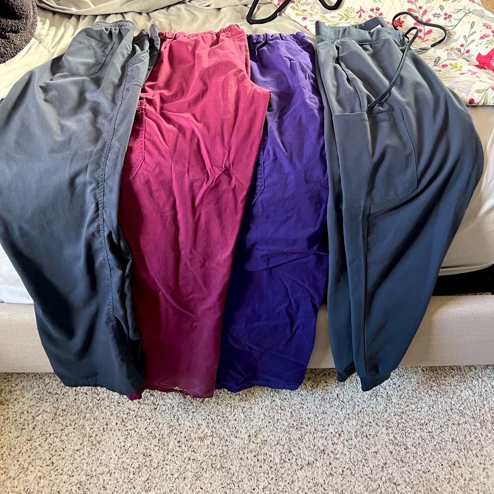 4 pairs of  Womens Scrub pants fits Size Medium some gently worn some like new